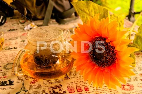 Tea and flowers Stock Photos
