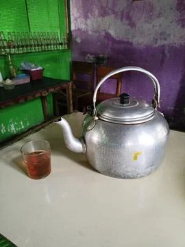 Tea and kettle Stock Photos