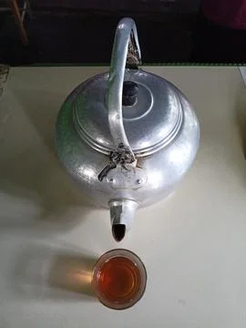 Tea and kettle Stock Photos