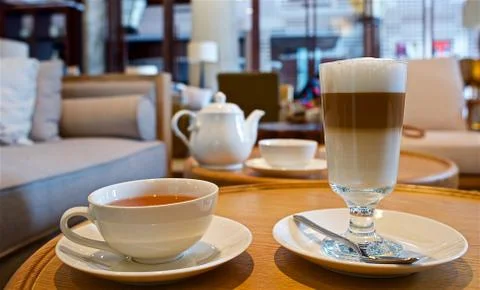 Tea and latte Stock Photos