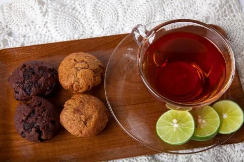 Tea and muffin Stock Photos