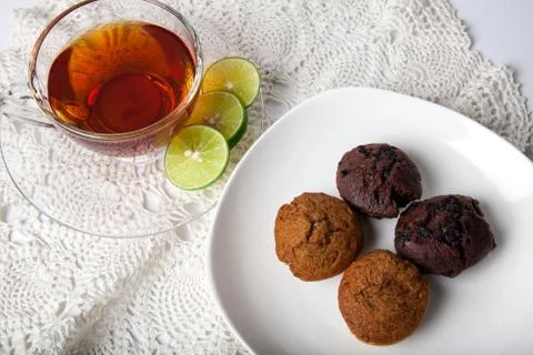 Tea and muffin Stock Photos