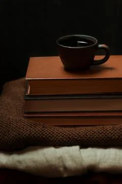 Tea and a stack of books Stock Photos