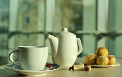 Tea and sweets Stock Photos