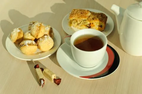 Tea and sweets Stock Photos