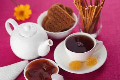 Tea and sweets on the table. Stock Photos