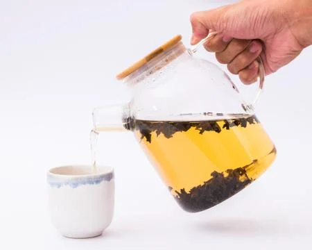 Tea and teapot Stock Photos
