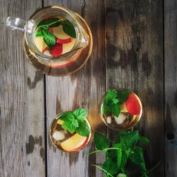 Tea with apples and mint Stock Photos