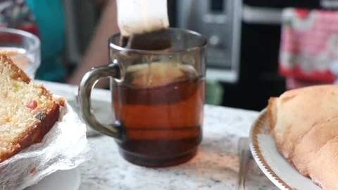 Tea bag add in cup. Time for Cup of tea. Fresh and hot tea. Transparent Glass fo Stock Footage 205875678