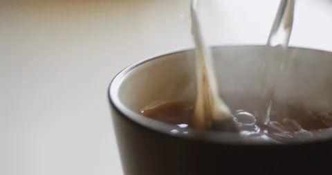 Tea bag is brewed in a mug Stock Footage 105175652