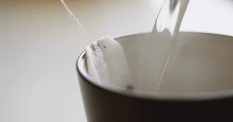 Tea bag is brewed in a mug Stock-Footage 105175764
