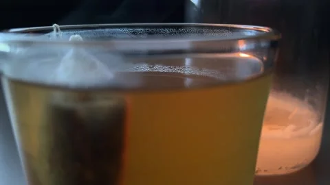 Tea Bag Brewing In Hot Water 스톡 동영상 296550697