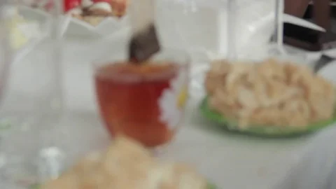 Tea bag in a cup and cake Video stock 70474028