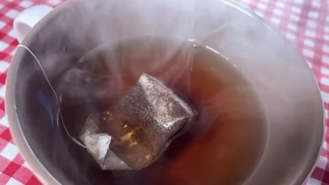 Tea bag in the cup Stock Footage 220740297