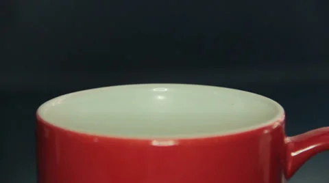 Tea Bag Dopped Into Cup Vidéo 27622603