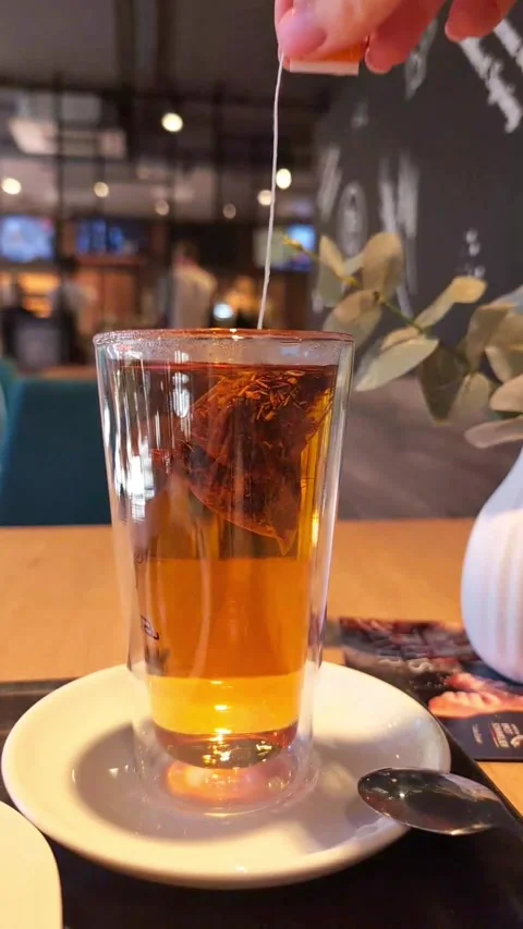 Tea from a bag in a tall glass. Stock Footage 278735100