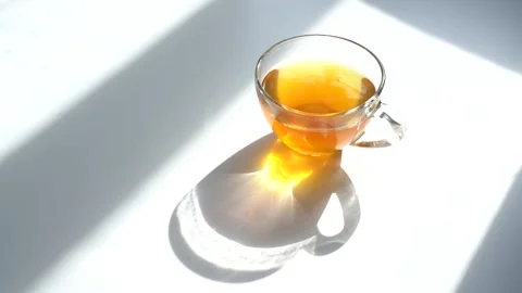 Tea Bag in a Tea Cup. Brew Green Tea in a Mug Stock Footage 151326470
