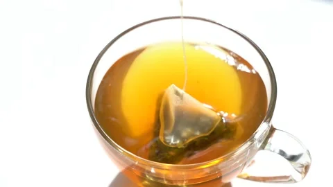 Tea Bag in a Tea Cup. Brew Green Tea in a Mug Stock Footage 170006879