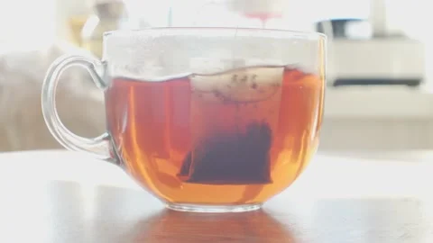 Tea Bag in a Transparent Mug Stock Footage 172535508