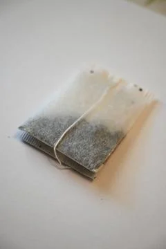 Tea Bag on White Background, Minimal Beverage Concept with Copy Space Stock Photos