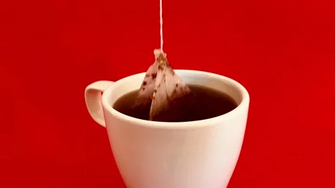 Tea bag in a white cup of tea Video stock 171531011