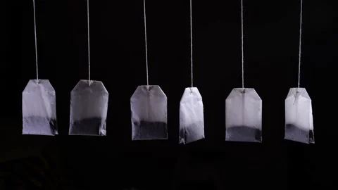 Tea bags on a dark background close up Stock Footage 148035956