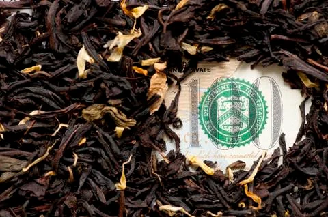 Tea on bank note Stock Photos