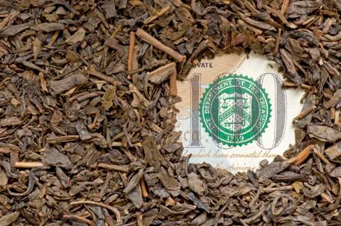 Tea on bank note Stock Photos