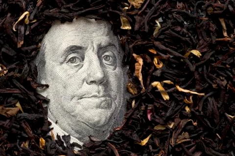 Tea on bank note Stock Photos
