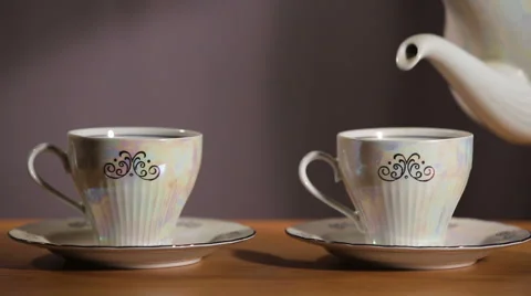 Tea being poured into cup Stock Footage 67200037