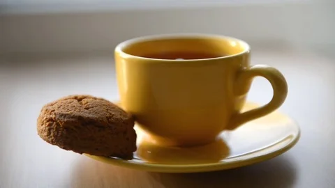 Tea being poured into cup Stock Footage 72623030