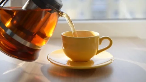 Tea being poured into cup Stock Footage 72623059