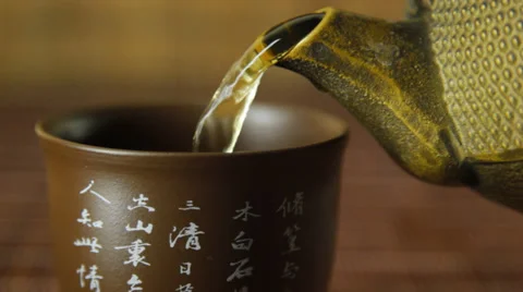 Tea being poured from the kettle Stock Footage 30642483