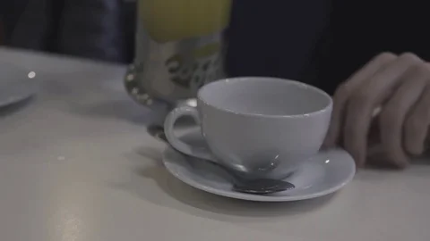 Tea being poured into a tea cup Stock Footage 85366403