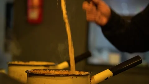 Tea is being strung to make it more tasteful in a local cafe in Pakistan. Stock Footage 242500353