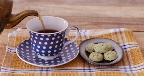 Tea biscuits with black tea, close up Stock Footage 114756313
