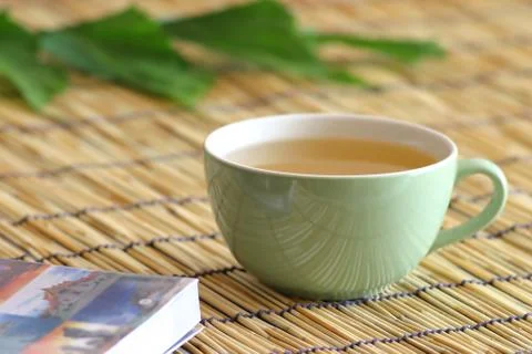 Tea with book Foto stock