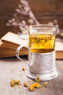 Tea on book Stock Photos