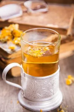 Tea on book Stock Photos