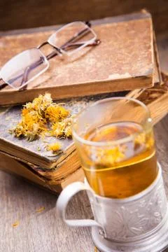 Tea on book Stock Photos