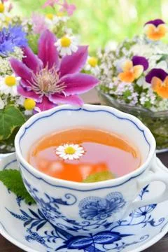 Tea break with flowers Foto stock