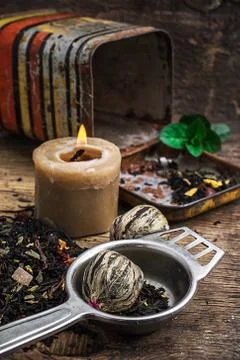 Tea brew with lime and mint on wooden background Stock Photos