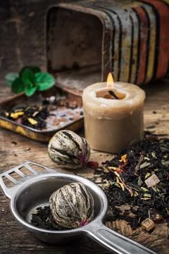 Tea brew with lime and mint on wooden background Stock Photos