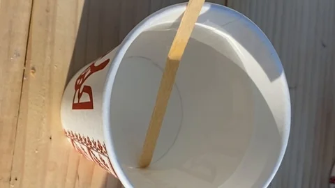 Tea brewing in a paper cup Stock Footage 124089064