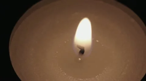 The tea candle turns. Top view Video stock 19643461