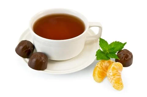 Tea with candy and mint Stock Photos