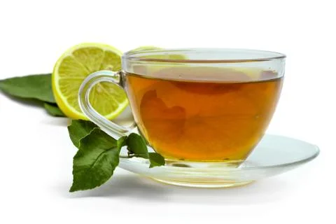 Tea cap and lemon Stock Photos
