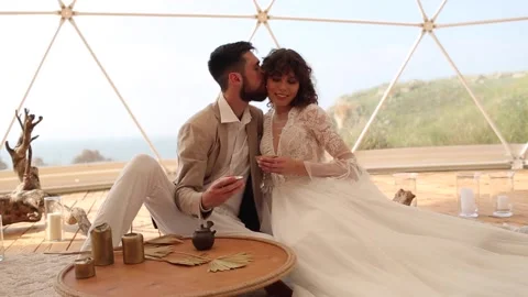 Tea ceremony at a boho wedding. Bride and groom in boho. Stock Footage 185987732