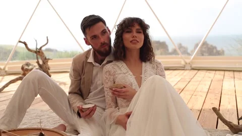 Tea ceremony at a boho wedding. Bride and groom in boho. Stock Footage 185987995