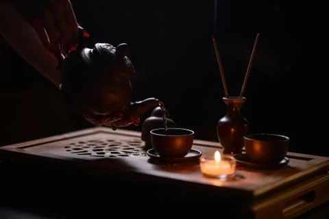 Tea ceremony with candles Stock Photos
